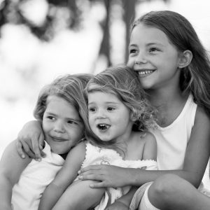 Three sisters Three beautiful sisters, having fun outside.